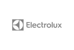 A imagem mostra o logotipo da Electrolux, apresentando um "E" estilizado dentro de uma forma circular à esquerda e a palavra "Electrolux" escrita em uma fonte moderna, sem serifa, à direita. Ambos os elementos estão em cinza.